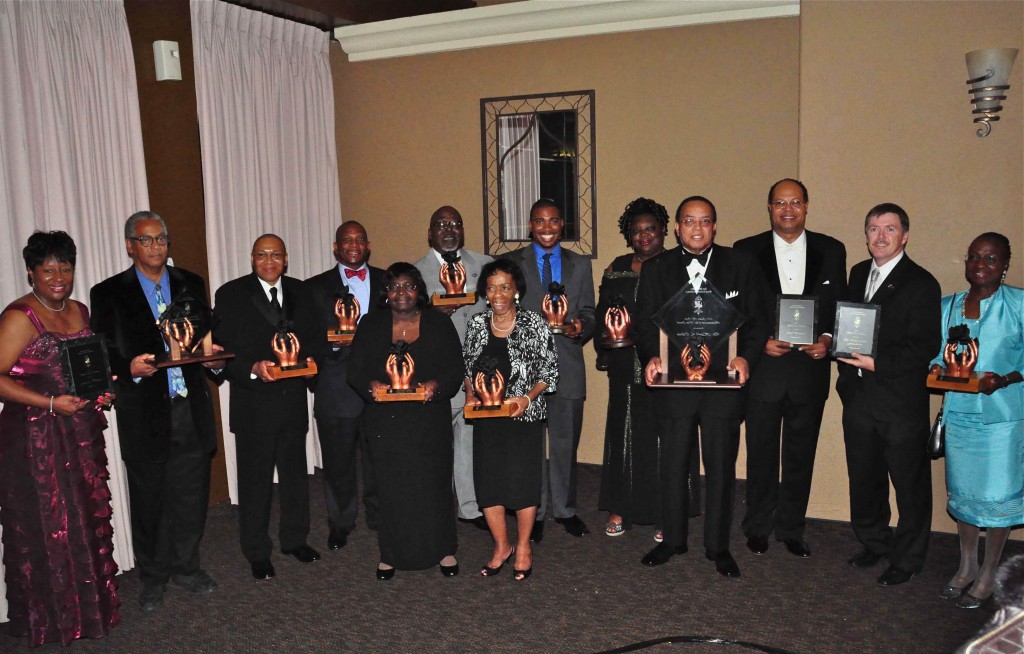 Honoring some of the unsung heroes who have worked diligently to improve the lives of others throughout the Inland Empire, The Black Cultural Foundation awarded the 2011 Black Rose Award to the following award community advocates: (back row left to right) Juanita Dawson, James Butts, Jimmie Brown, Herb English Jr., John Futch, Mark Campbell, Vicki Lee, Carl Dameron, Timothy Evans from The Unforgettables Foundation, Dr. Queen Hamilton, (left to right front row) Geraldine Reaves, Jennifer Vaughn-Blakely and Dr. Harold Cebrun. Photo by Chris Sloan.