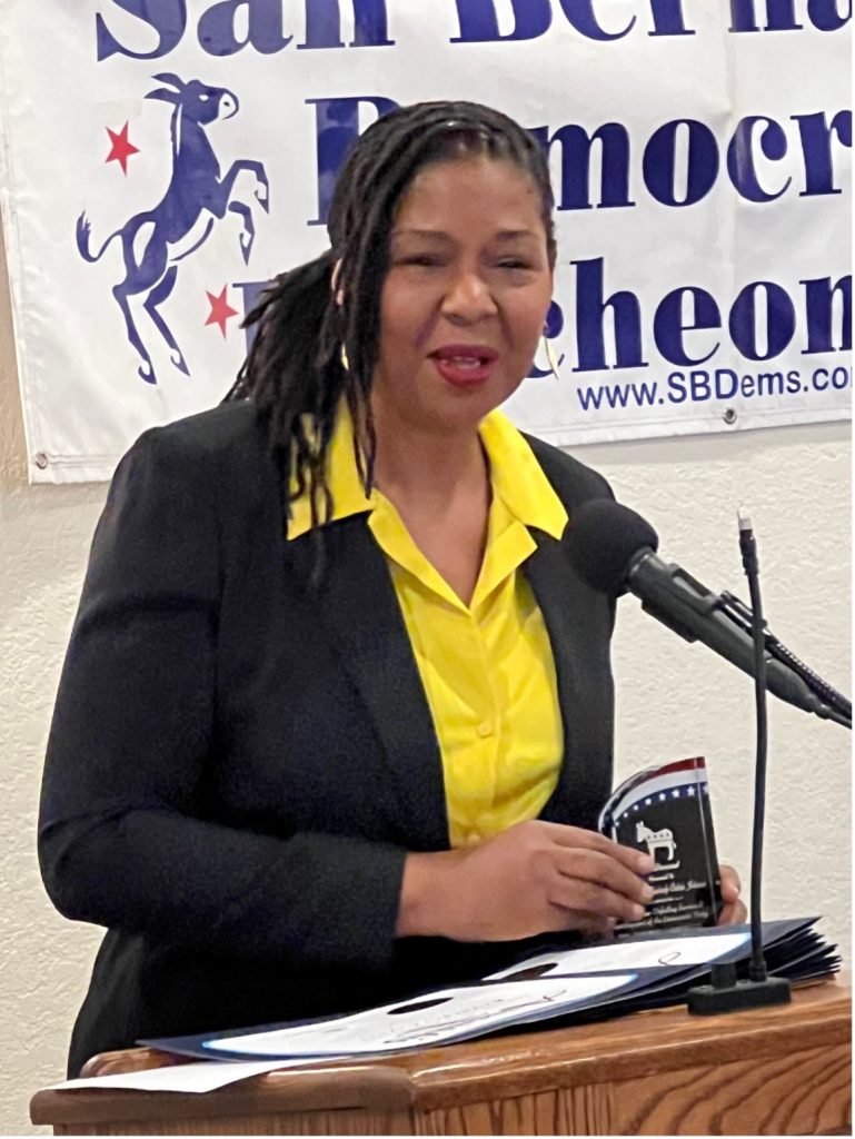 Photo caption: San Bernardino Sixth Ward Councilmember Kimberly Calvin accepts the Democratic Luncheon Club’s Democrat of the Year 2024 recognition award.