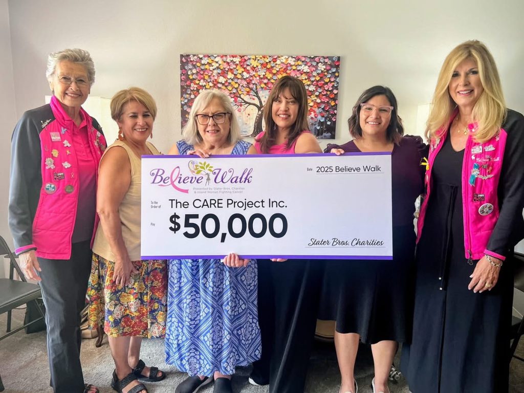 The CARE Project, Inc. has received a $50,000 check from Believe Walk, pictured left to right: from Believe Walk, Cathy Stockton; Jennie Marie Ramirez, CARE Project Board member; Diana Jaurigue, CARE Project Board member; Carrie Madrid, CARE Project President; and Believe Walk Members Crystal Gonzalez and Annie Sellas.